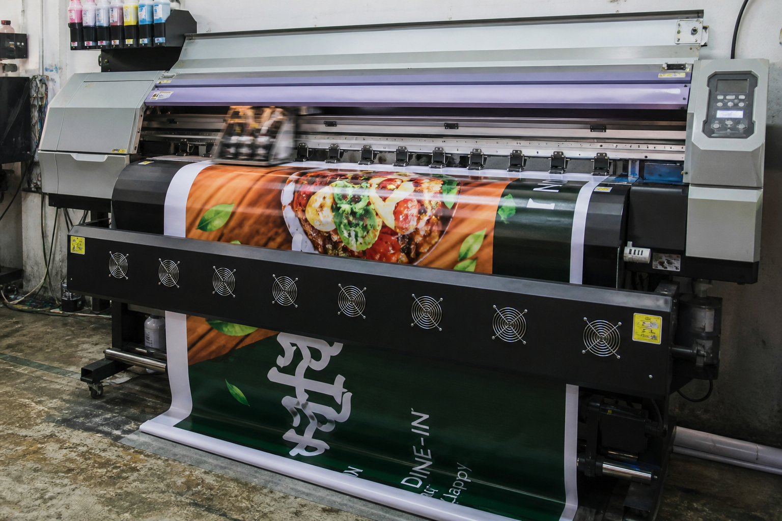 Panaflex machine printing a large-format vinyl banner